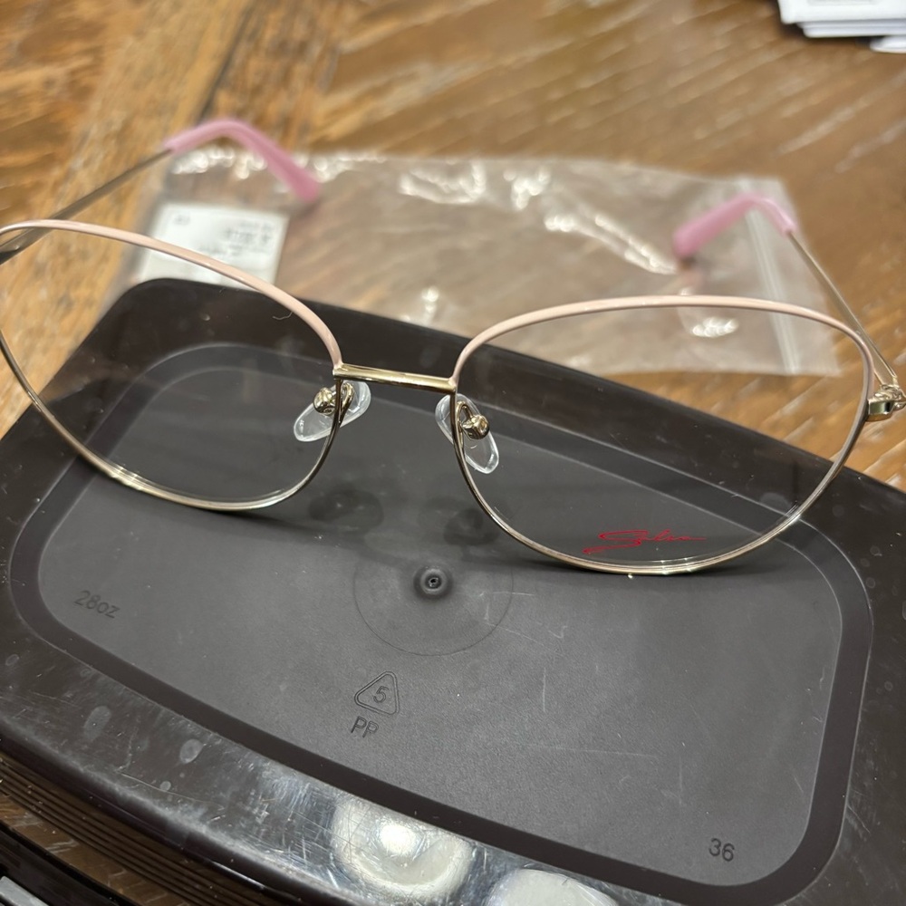 Chic Pink and Gold Glasses with Minimalist Design